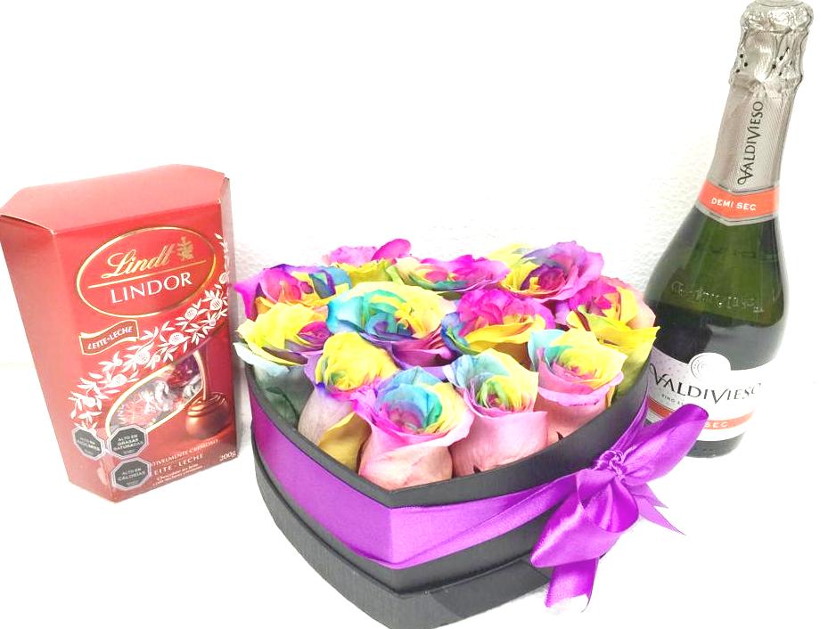 Caja Corazn con 12 Rosas Arcoris, Bombones Lindor 200grs y Champagne 375cc
